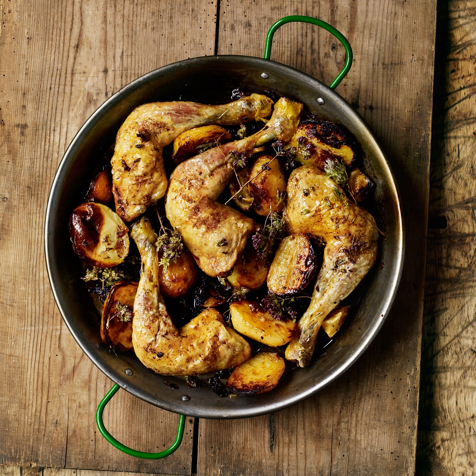 Chicken, lemon and potatoes with wild oregano