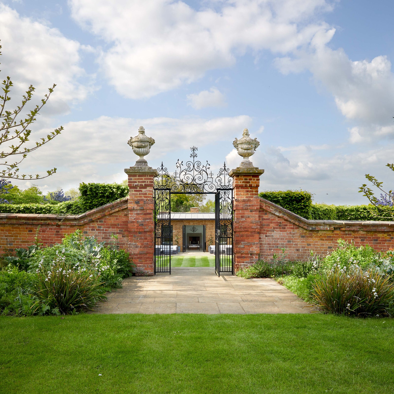 An intriguing modern house set within the walled garden of a storied 17th-century estate